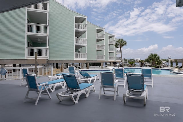16310 Perdido Key Dr, Pensacola, FL 32507 - view of patio / terrace with a community pool