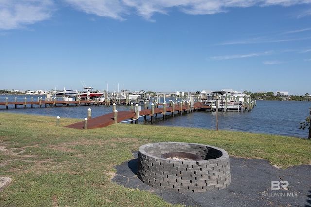 16310 Perdido Key Dr, Pensacola, FL 32507 - dock area featuring a lawn, a water view, and a fire pit