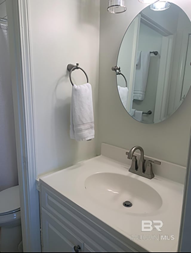 16310 Perdido Key Dr, Pensacola, FL 32507 - bathroom featuring vanity and toilet