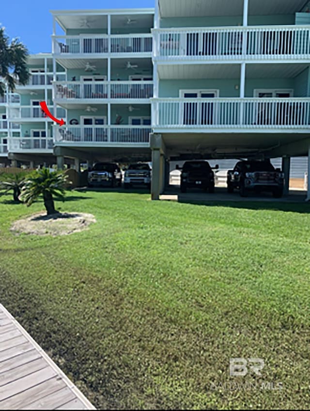 16310 Perdido Key Dr, Pensacola, FL 32507 - view of property's community with a lawn