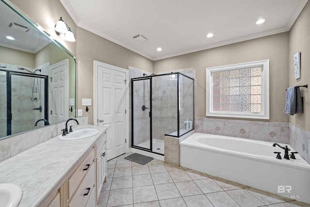 9791 Aspen Cir, Spanish Fort, AL 36527 - full bath featuring a garden tub, double vanity, a stall shower, tile patterned flooring, and recessed lighting