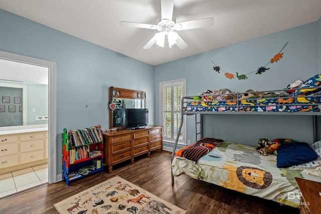 9791 Aspen Cir, Spanish Fort, AL 36527 - bedroom featuring wood finished floors, connected bathroom, and ceiling fan