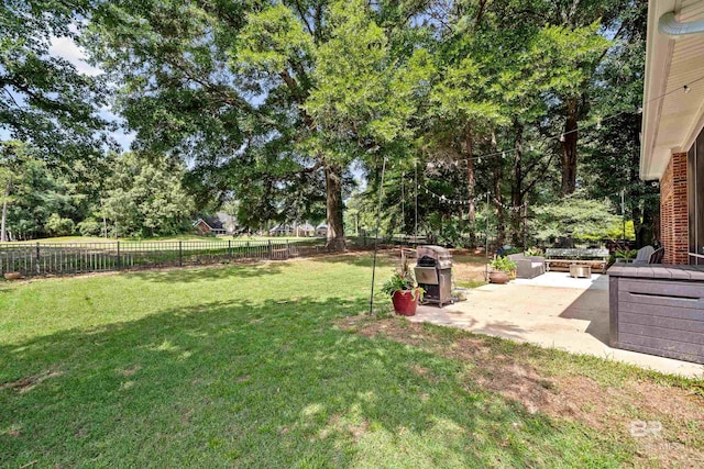 9791 Aspen Cir, Spanish Fort, AL 36527 - fenced backyard featuring a patio and view of scattered trees