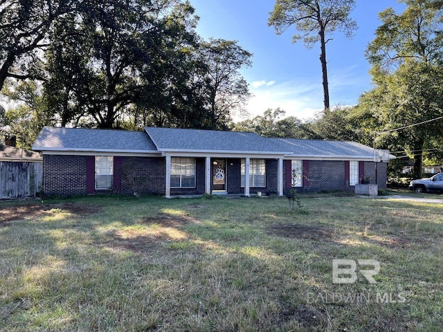 ranch-style home with a front lawn