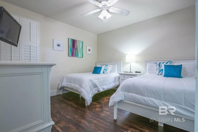 28107 Perdido Beach Blvd Unit D209, Orange Beach, AL 36561 - bedroom featuring wood finished floors, a ceiling fan, and baseboards