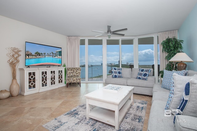 28107 Perdido Beach Blvd Unit D209, Orange Beach, AL 36561 - living area featuring floor to ceiling windows and ceiling fan
