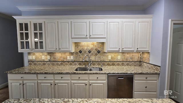 kitchen with crown molding, sink, white cabinets, and stainless steel dishwasher