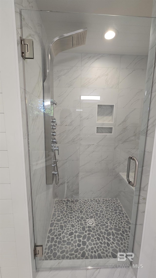 bathroom with walk in shower