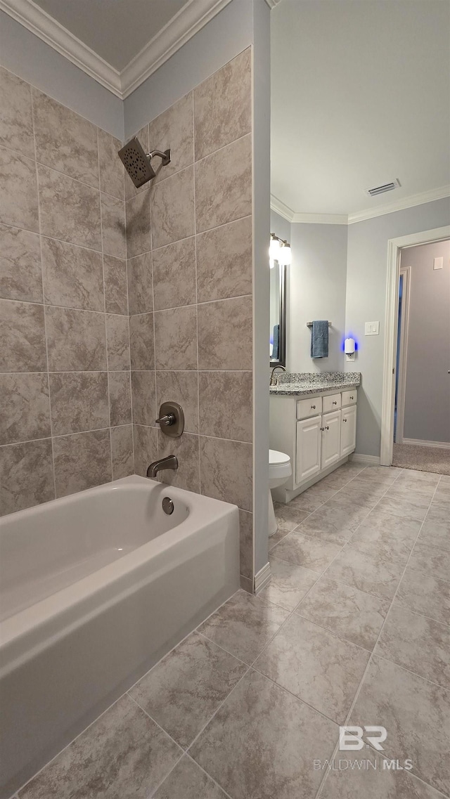 full bathroom with toilet, vanity, tiled shower / bath combo, and crown molding