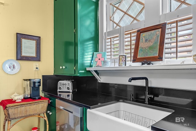 kitchen featuring dishwasher, a healthy amount of sunlight, and sink