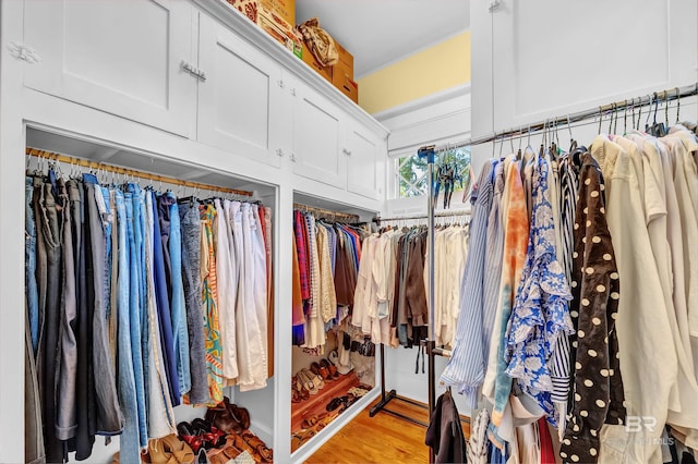 walk in closet featuring light hardwood / wood-style floors