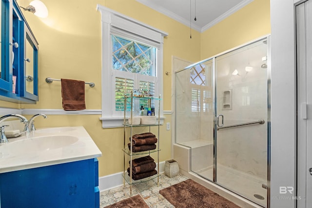 bathroom featuring ornamental molding, tile patterned flooring, walk in shower, and vanity