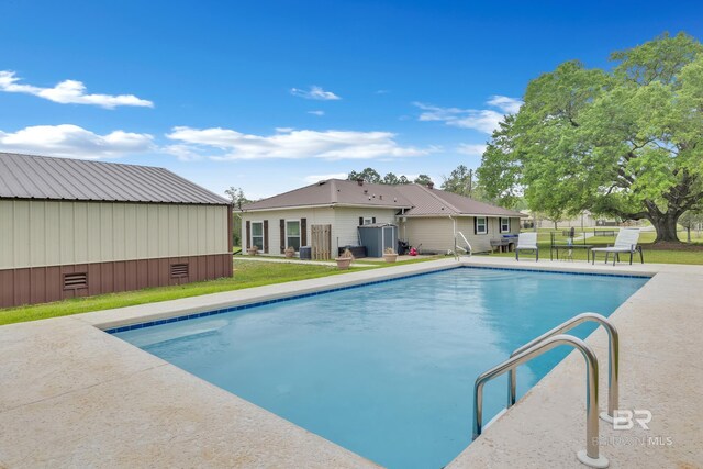 view of pool with fence and a fenced in pool