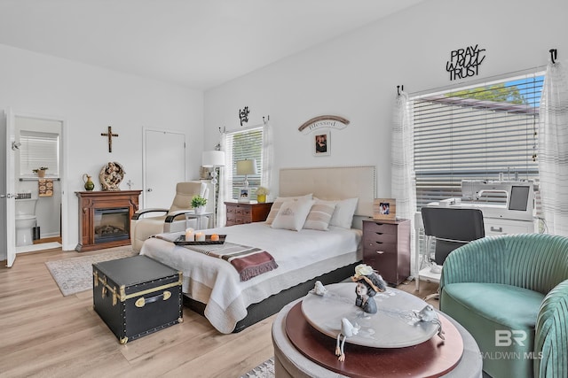 bedroom with light wood-type flooring