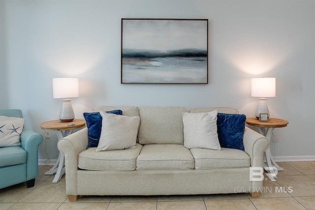 tiled living room with baseboards