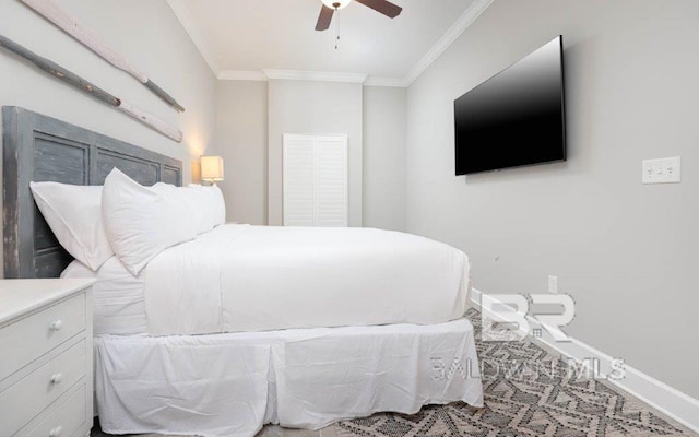 bedroom with baseboards, a ceiling fan, and crown molding