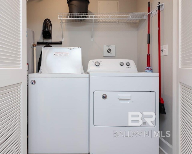 washroom with laundry area and washer and clothes dryer