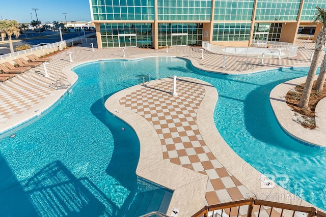 community pool with a patio