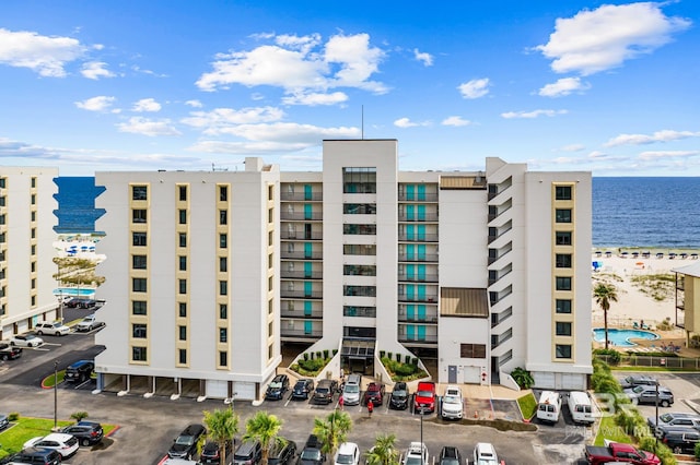 view of building exterior with a water view