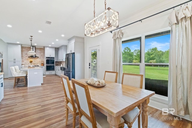 dining area featuring light hardwood / wood-style floors