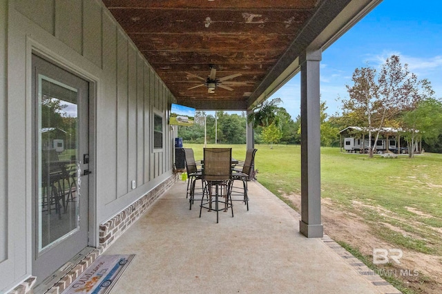 view of patio / terrace featuring ceiling fan