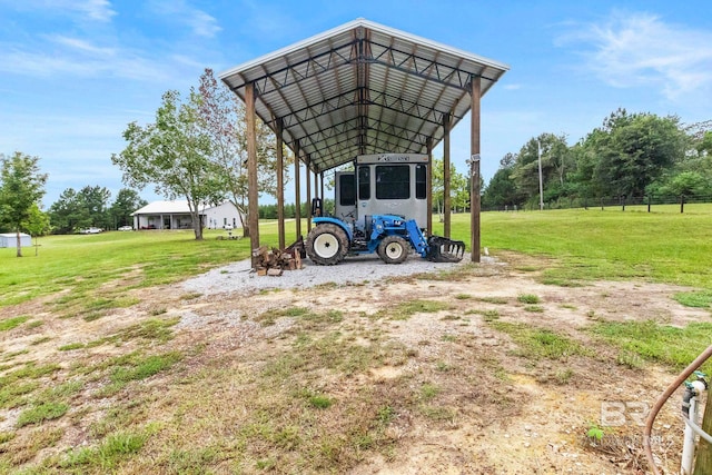 view of parking / parking lot with a yard