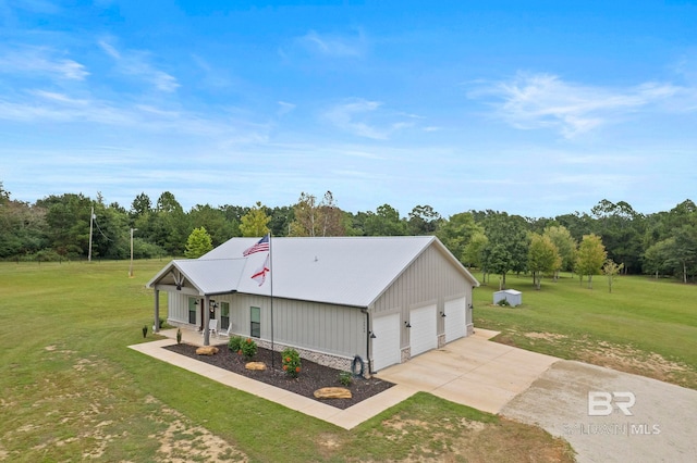 view of home's exterior featuring a garage, a porch, and a yard