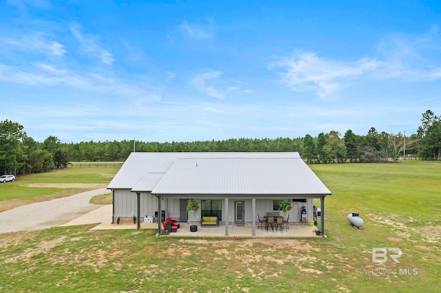 exterior space with a porch and a front lawn