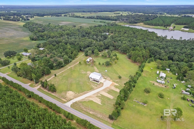 drone / aerial view with a water view and a rural view