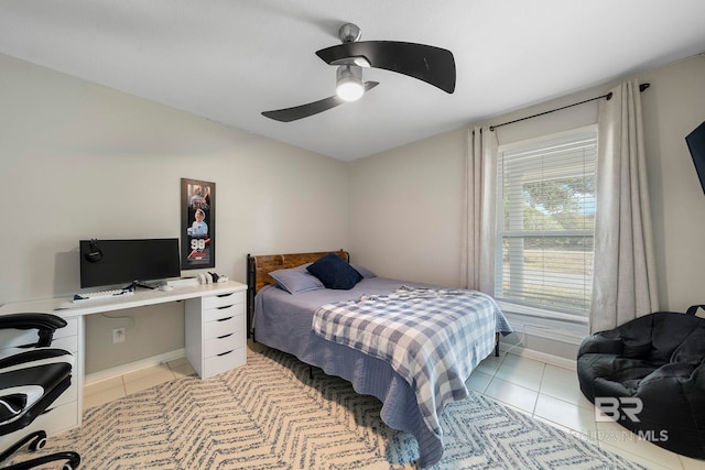 bedroom featuring ceiling fan and light tile patterned floors