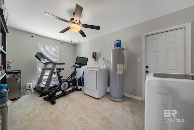 workout room featuring independent washer and dryer, water heater, and ceiling fan