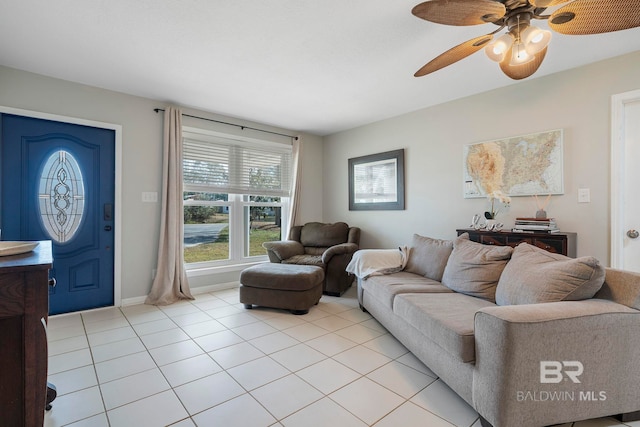 tiled living room with ceiling fan