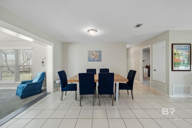 dining room featuring light tile patterned flooring