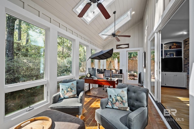 22649 Alice Ln, Fairhope, AL 36532 - sunroom featuring a wealth of natural light, lofted ceiling with skylight, wood ceiling, and a ceiling fan