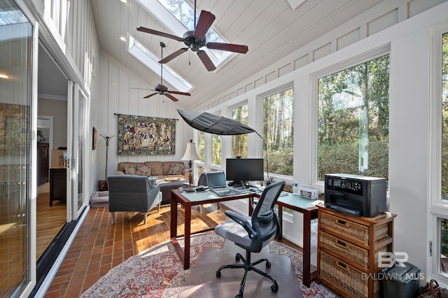 22649 Alice Ln, Fairhope, AL 36532 - office featuring high vaulted ceiling, a skylight, and brick floor