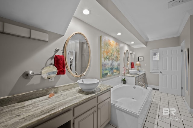 22649 Alice Ln, Fairhope, AL 36532 - full bathroom with tile patterned floors, crown molding, recessed lighting, a bath, and vanity