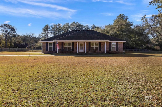 ranch-style home with a front yard