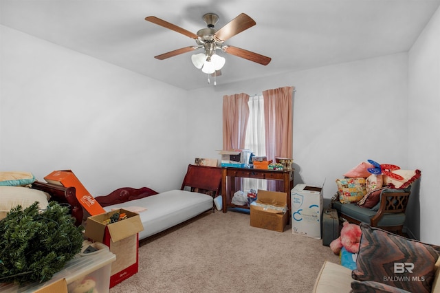 bedroom featuring light carpet and ceiling fan