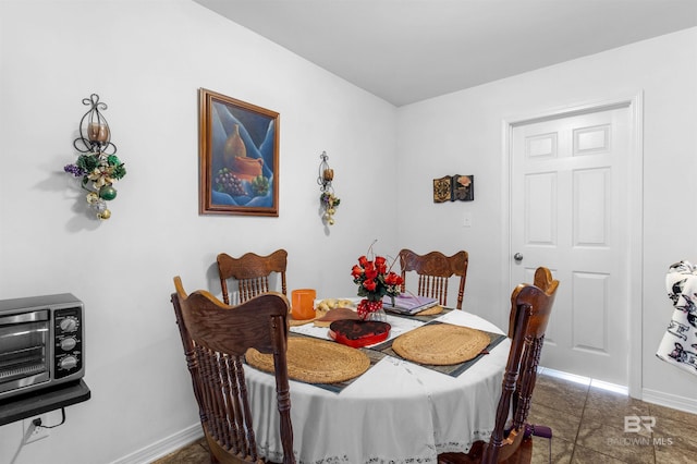 view of tiled dining room