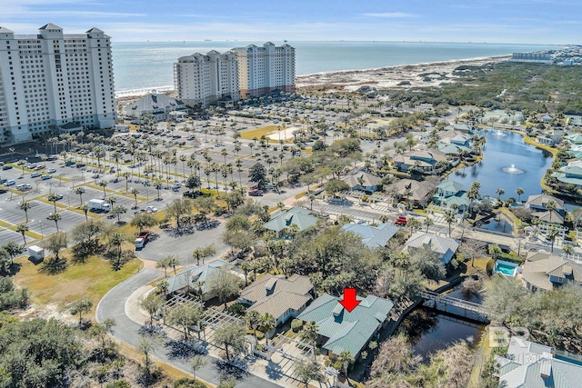 bird's eye view featuring a water view and a city view