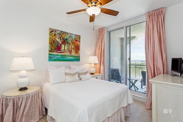 bedroom featuring light carpet, ceiling fan, and access to exterior