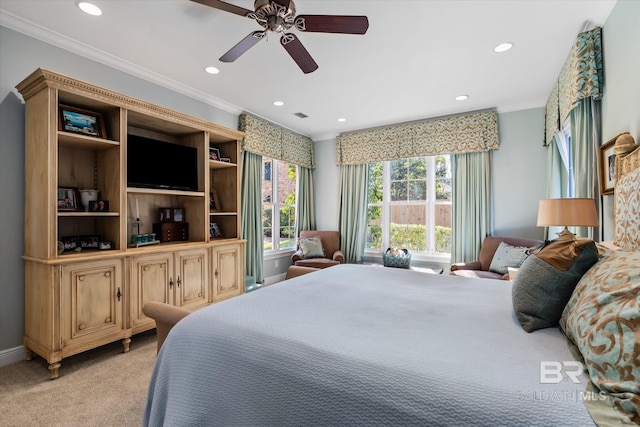 bedroom featuring ceiling fan, light colored carpet, and ornamental molding