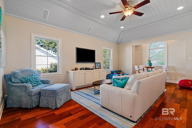 living room featuring vaulted ceiling, dark hardwood / wood-style floors, ceiling fan, ornamental molding, and wood ceiling