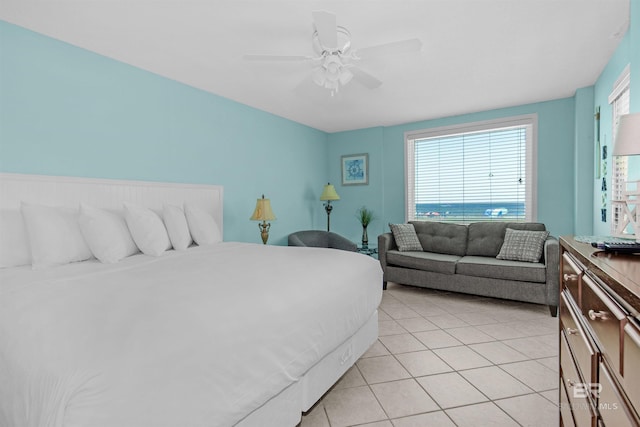 tiled bedroom with ceiling fan