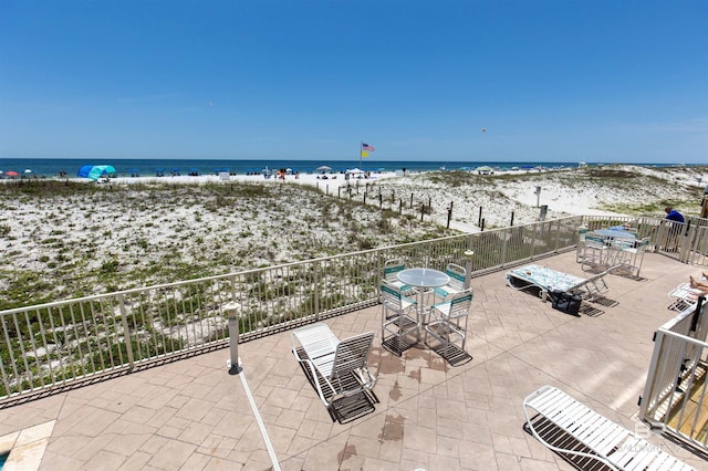 property view of water featuring a beach view