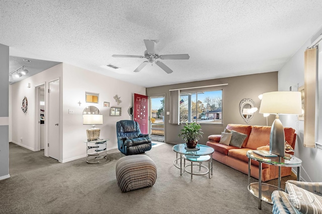 526 W Ariel Ave, Foley, AL 36535 - living room featuring a textured ceiling, carpet floors, and ceiling fan