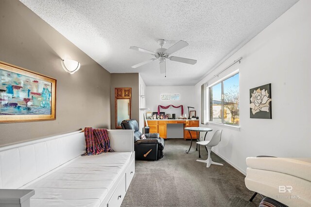 526 W Ariel Ave, Foley, AL 36535 - carpeted bedroom with ceiling fan and a textured ceiling