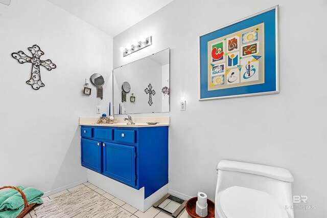 526 W Ariel Ave, Foley, AL 36535 - bathroom with vanity and toilet