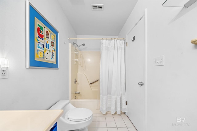 526 W Ariel Ave, Foley, AL 36535 - full bathroom with tile patterned floors, toilet, vanity, and shower / bath combo