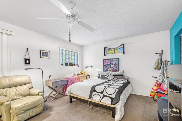 526 W Ariel Ave, Foley, AL 36535 - carpeted bedroom featuring ceiling fan and a textured ceiling